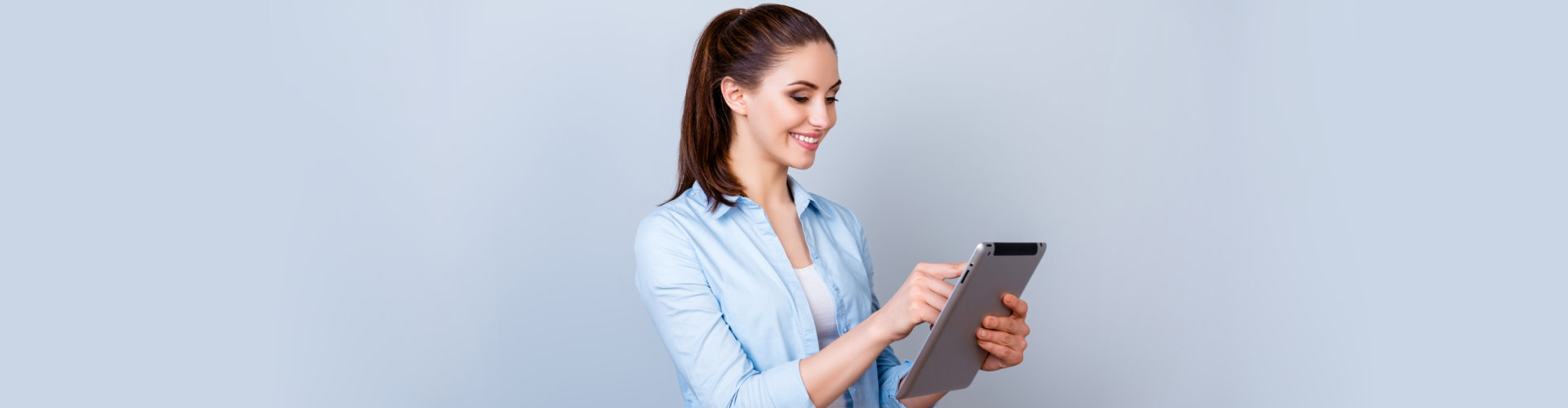 woman using tablet