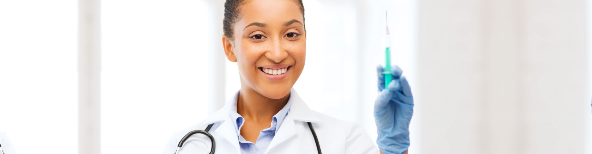 nurse holding syringe